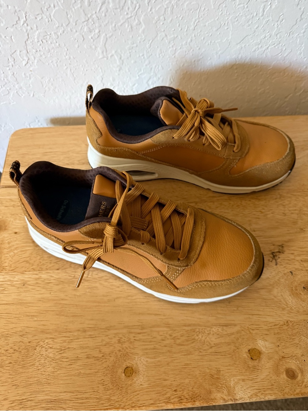 Skechers Men's Brown and Tan composite toe work shoes.